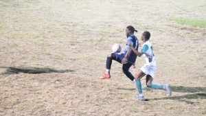Action between Cayon and Garden Hotspurs on Saturday at the Newtown Playing Field. 