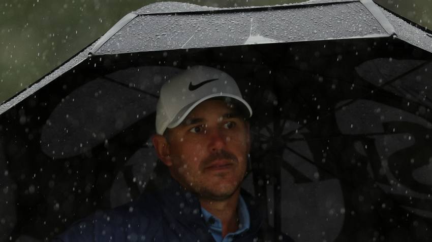 The Masters: Koepka extends lead before rain stops third round