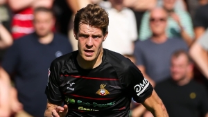 Doncaster leave it late as Joe Ironside penalty earns point at Sutton