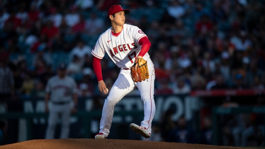 Shohei Ohtani strikes out 12, hits two-run triple to carry Angels to win over Astros