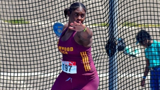 Cedricka Williams set a massive new record in the Class I Girls discus competition.