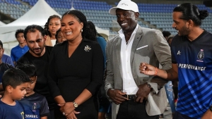 T&amp;T&#039;s Minister of Sport and Community Development Shamfa Cudjoe-Lewis and Soca Warriors Head coach Dwight Yorke.