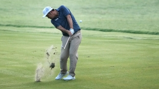 John Huh leads by two strokes after opening round of the Wyndham Championship