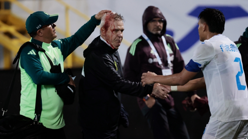 Mexico boss Aguirre struck by beer can after Honduras defeat