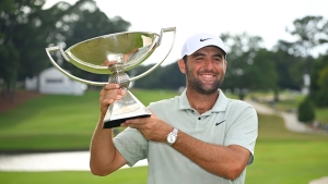 Scheffler holds off Morikawa for Tour Championship success