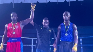 Former boxer and national coach Richard ‘Shrimpy’ Clarke shares the happy moment with Delano McLaughlin of the JDF Gym who won the final bout of the night of the start of competitive boxing for 2024 at the Stanley Couch Gym – under the Gloves Over Guns Futures Programme. McLaughlin defeated Kirk-Patrick Heron of the Port Antonio Gym in a light heavyweight match-up on Saturday night.