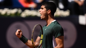 Alcaraz fights back from the brink to set up Barcelona final against Carreno Busta