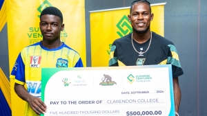 Reggae Boyz captain and JustBet ambassador Andre Blake donates JMD$500,000 to Clarendon College in support of athletic development