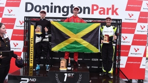 Jamaica&#039;s Tommi Gore (centre) tops the podium during an outing in England recently.