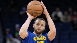 Warriors to re-evaluate Curry foot sprain &#039;in two weeks&#039;
