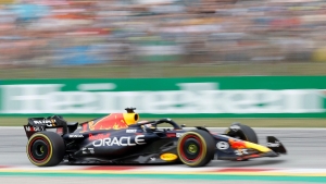 Max Verstappen wins Spanish GP as Lewis Hamilton and George Russell make podium