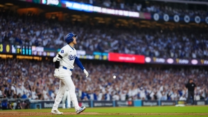 Ohtani hits 3-run homer in postseason debut as Dodgers rally past Padres