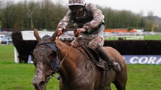 Nassalam powers through the mud for Welsh National glory