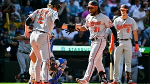 Cedric Mullins robs homer in 9th, hits 2-run blast in 10th to lead Baltimore Orioles to wild win over Seattle Mariners