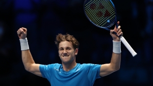 ATP Finals: Ruud fights back to beat Rublev and reach semis
