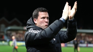 Gary Caldwell hails 10-man Exeter’s character in win over Burton