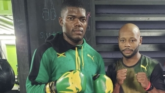 Ennis (left) with boxing consultant Sakima Mullings, is set to make his professional debut this weekend.