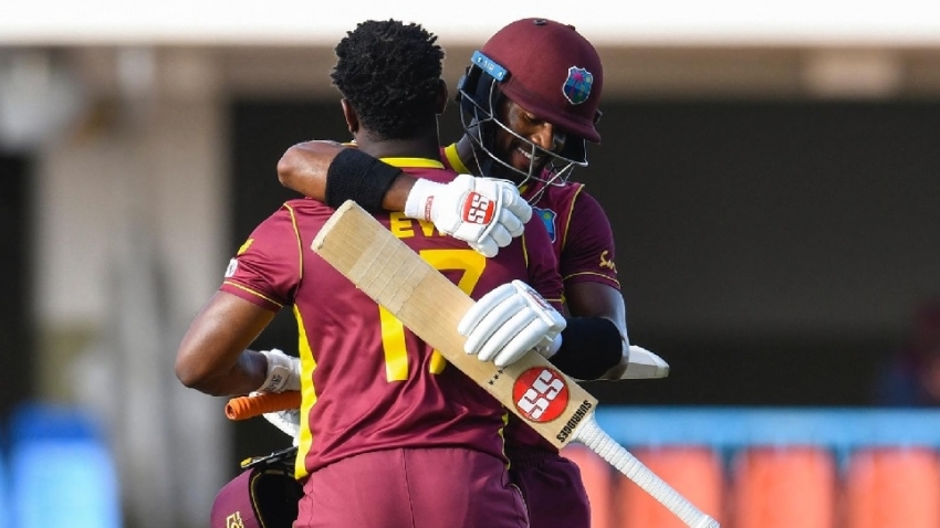 Evin Lewis and Shai Hope share an embrace after the former scored his fourth ODI century.