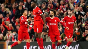 Mohamed Salah on target as Arsenal return to summit after draw at Liverpool