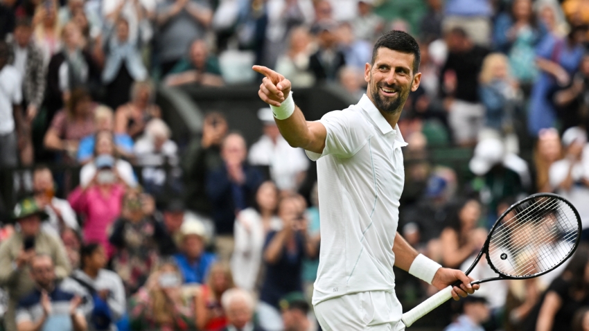 Wimbledon: Djokovic &#039;would not have risked&#039; knee injury at any other tournament