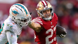 McCaffrey and defense key to Purdy-led 49ers holding off fast-finishing Brady