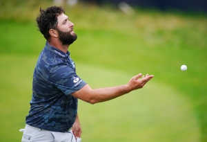 Jon Rahm shoots stunning 63 to surge into contention at The Open