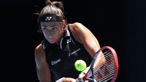 Top seed Garcia recovers from set down to beat Van Uytvanck in Lyon