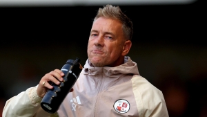 Crawley’s character cheers Scott Lindsey as they come from two goals down to win