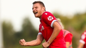 Ten-man Wrexham fight back three times to earn dramatic draw with Crewe