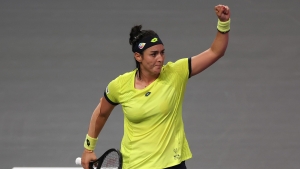 Jabeur keeps WTA Finals hopes alive with comeback win over Pegula