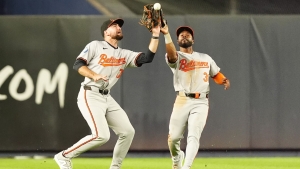 Orioles hold off Yankees in 10 innings after Cole makes season debut
