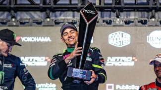 Fraser McConnell lifts the coveted Nitrocross Trophy in Las Vegas in the final round last season.