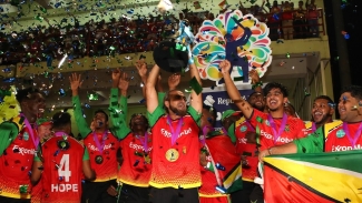 Guyana Amazon Warriors celebrating their historic first-ever CPL title following an emphatic nine-wicket victory over Trinbago Knight Riders on Sunday. 