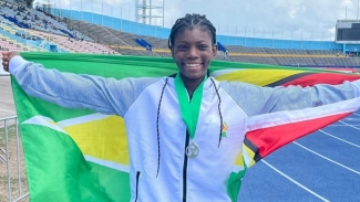 Gibbon successfully defending the title she won at the 49th Carifta Games in Jamaica last year.
