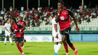 Dantaye Gilbert celebrates his opening goal against Cuba.