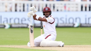 West Indies batsman Kavem Hodge reacts after his dismissal.