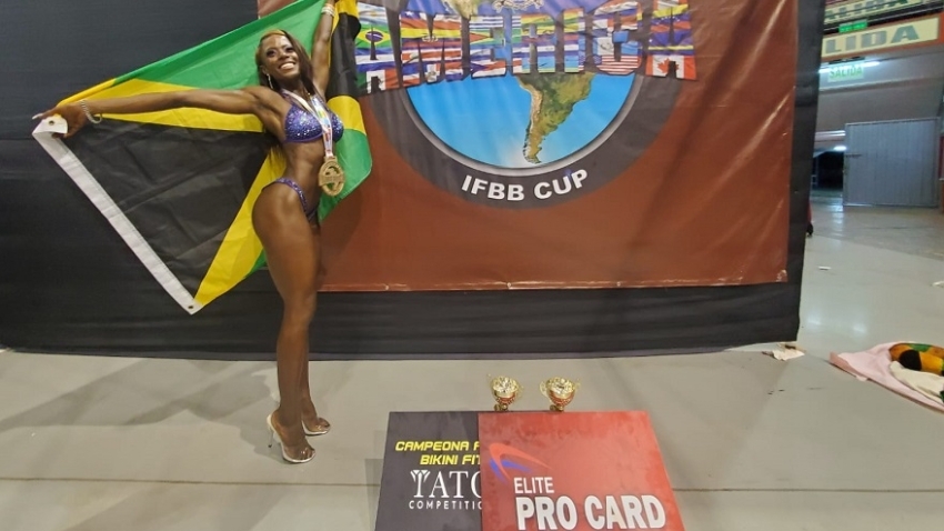 Lewis won her height class and the overall title in Lima, Peru.