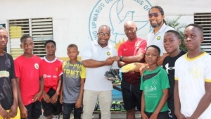 Hydel receives donation of football gear from Champions Football Academy
