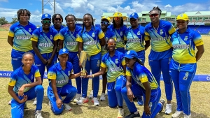 Barbados holding the CWI Women&#039;s T20 Blaze trophy after defeating the Leeward Islands by eight wickets at Warner Park on Saturday.