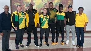 From left: JOA President Christopher Samuda, Archery Coach Angelo Baker, Volleyball Coach O&#039;Neil Ebanks, Archer Emma Russ, Judo Coach and Athlete Steven Moore, Volleyball Player Chevonna Lewis, Motorsports Racing Driver Fraser McConnell and JOA First Vice President Jacqueline Cowan