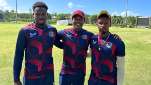 Kirk McKenzie (left) and Alick Athanaze (right) with West Indies legend Brian Lara (middle).