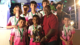 Members of Bermuda&#039;s team pose with their trophy after placing third in the boys&#039; category at the just-concluded CASA Junior Championships in St Vincent and the Grenadines.
