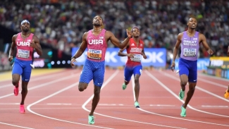 Lyles completes sprint double in Budapest