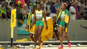 (From left) Shashalee Forbes, Shericka Jackson and Natasha Morrison, cut concerned figures as they head to check on teammate Shelly-Ann Fraser-Pryce after the women&#039;s 4x100m relay final in Budapest, Hungary on Saturday.
