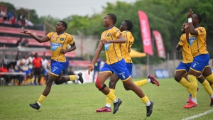 Clarendon College players celebrate a goal against Hydel High.