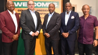 (from left) JFF president Michael Ricketts; Concacaf president Victor Montagliani; Lyndon Cooper, St Lucia FA president; Bermuda FA president Mark Wade, and JFF general secretary Dennis Chung share a photo opportunity.