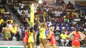 Jamaican goal shooter Romelda Aiken-George taking a shot during the third Test between the Sunshine Girls and England Roses at the National Indoor Sports Centre on Monday.