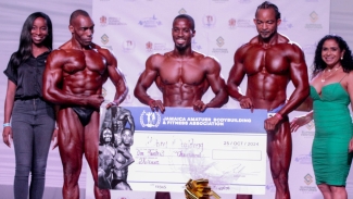 Supreme Ventures Limited (SVL) Events and Sponsorship Officer Gabrielle Waite with the top 3 winners in the Bodybuilding Open category: 3rd place Andrew Chisholm, 1st place Nicolas Wilson, 2nd place Henry Graham and Jamaica Amateur Bodybuilding and Fitness Association (JAABFA) President Audrey Allwood at the inaugural Supreme Ventures Jamaica Invitational Bodybuilding Championships at the Courtleigh Auditorium on Saturday.