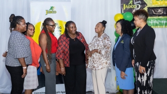 Debby Ann Brown Salmon (right), Chairperson at JADCO, June Spence Jarrett (2nd right), Executive Director, JADCO and the Hon. Oliva Grange (3rd right), Minister of Culture, Gender, Entertainment and Sport (MCGES), engage in dialogue with Dawn-Marie Richards (centre), President, Sandra Chisolm (3rd left), 2nd Vice President, Camille Williams (2nd left) and Denise Dacres-Reeves (left), 1st Vice President, all of the Nurses Association of Jamaica. The occasion was the 10th annual staging of the Jamaica Anti-Doping Commission (JADCO) Symposium held at the Terra Nova All-Suite Hotel in Kingston on Thursday, January 25, 2024.