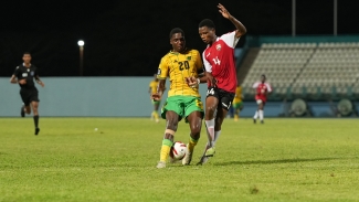 Jamaica and Trinidad and Tobago in action.